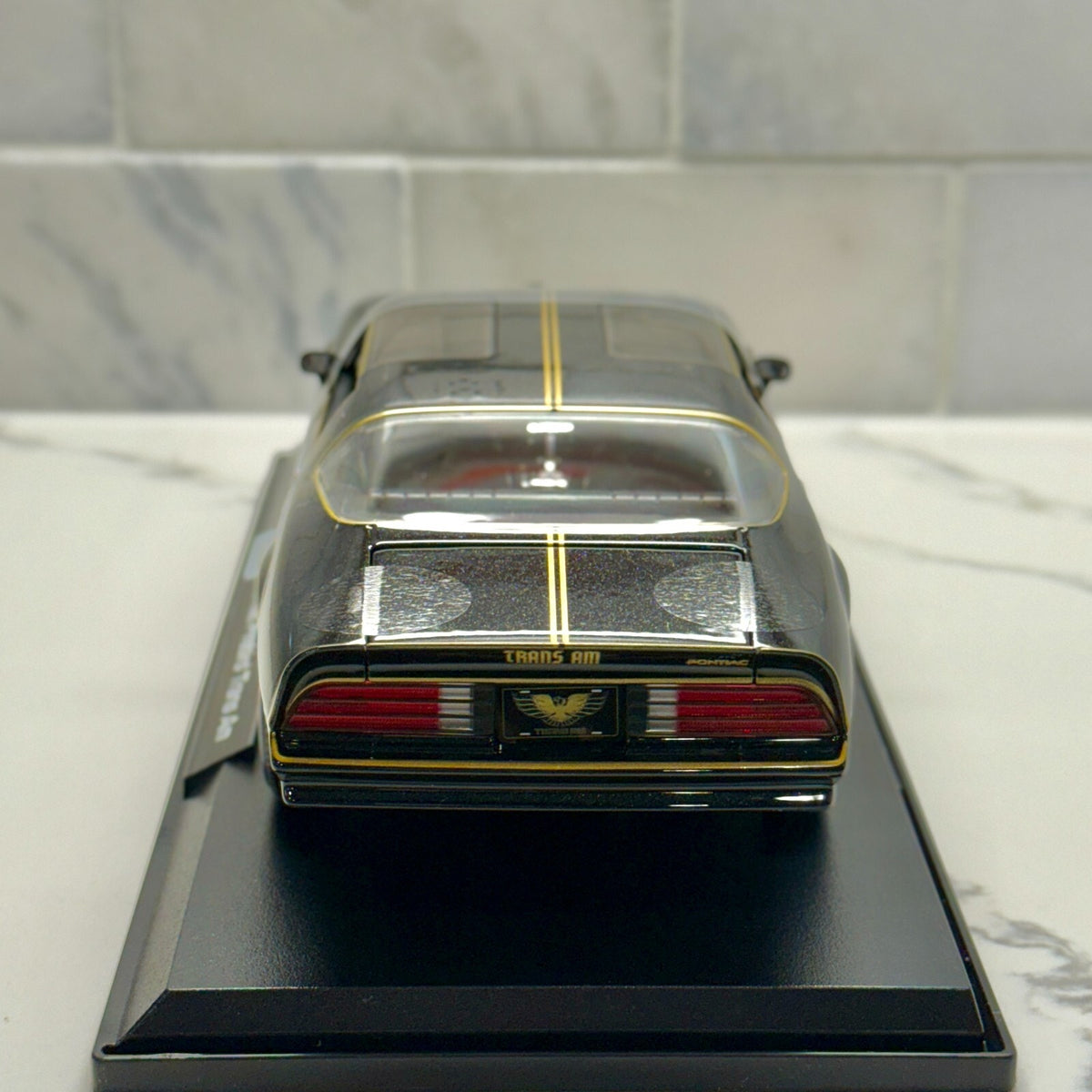 1977 Pontiac Trans Am 'Smokey and the Bandit' Diecast Car 1/18 Scale Black Gold | New - Product Image
