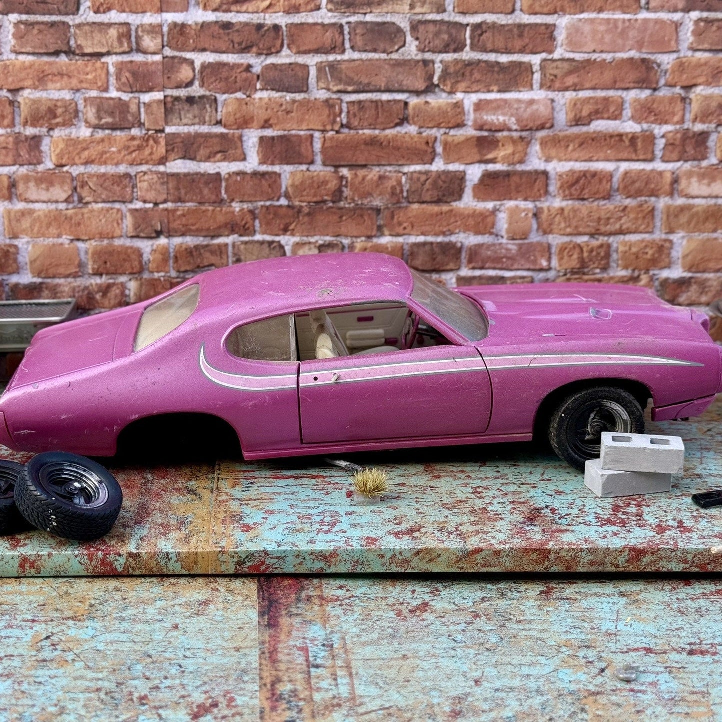 American Muscle 1969 Pontiac GTO Pink 1/18 Scale Diecast Model Car | Parts Car - Product Image