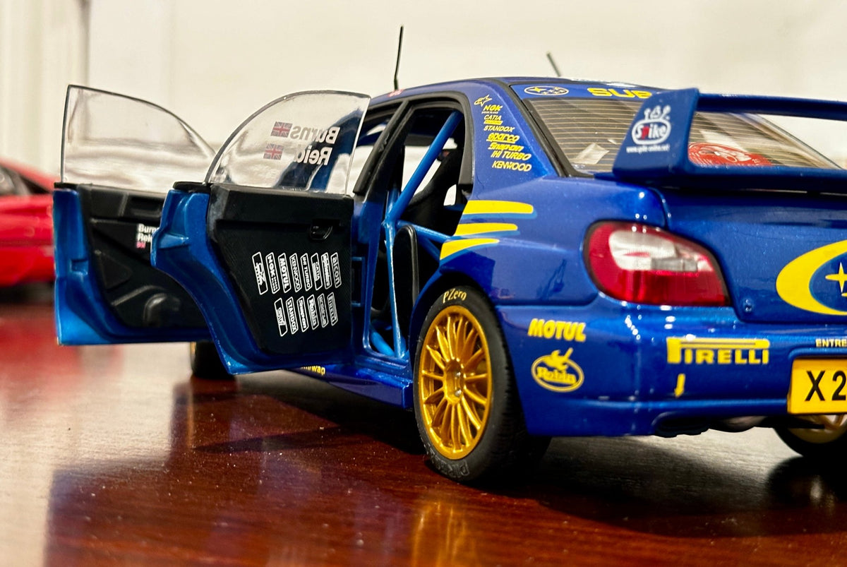 AUTOart 2001 Subaru WRX '#5 Burns Reid Rally Portugal' Blue 1/18 Scale Diecast Model Car - Product Image