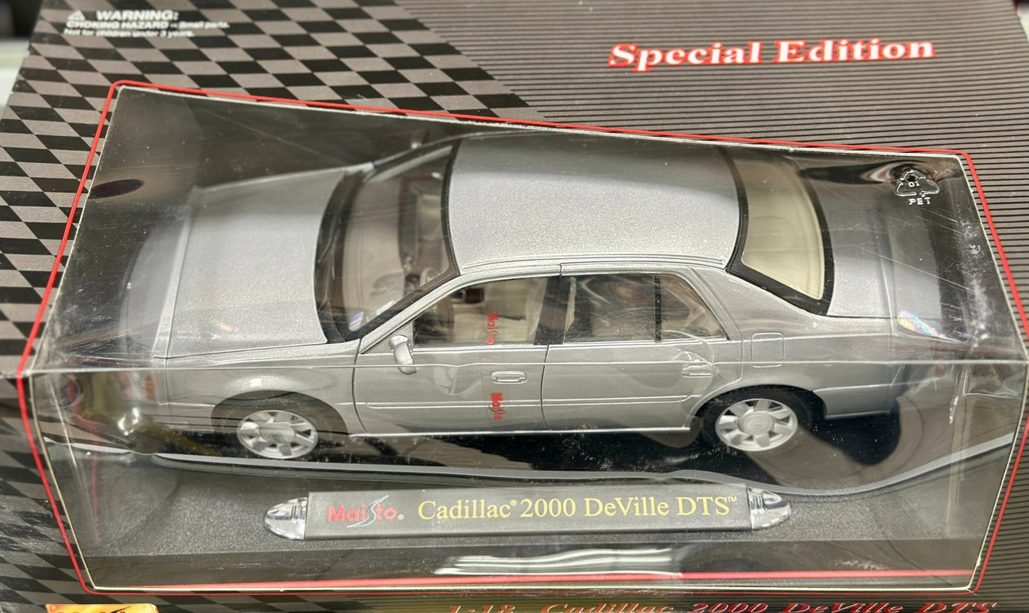 Maisto Cadillac 2000 Deville DTS Gray 1/18 Scale Diecast Model Car | New - Product Image