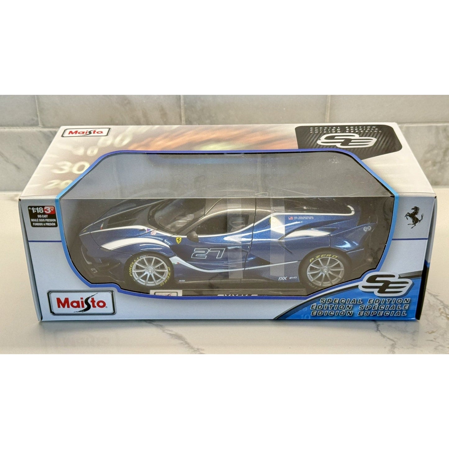 Maisto Ferrari FXXK Evo '#27 Blue P. Mann' Blue 1/18 Scale Diecast Model Car | New - Product Image