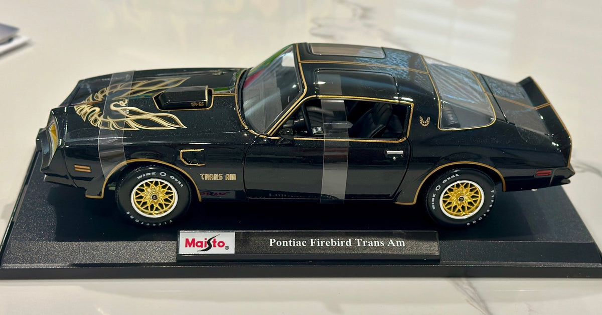 Maisto Pontiac Trans Am Firebird Black w/ Gold Livery 1/18 Scale Diecast Model Car | New - Product Image