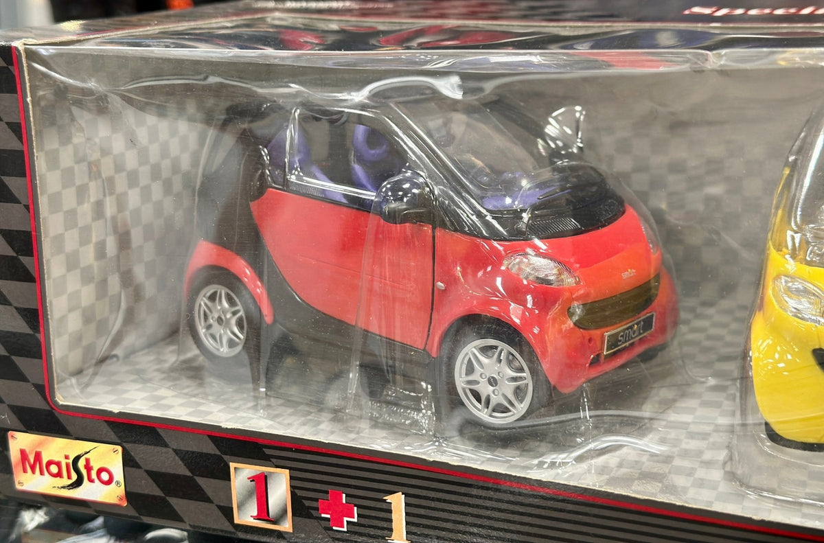 Maisto Smart Car Bundle Red and Yellow 1/18 Scale Diecast Model Car - Product Image