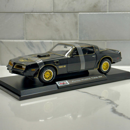 1977 Pontiac Trans Am 'Smokey and the Bandit' Diecast Car 1/18 Scale Black Gold | New - Product Image