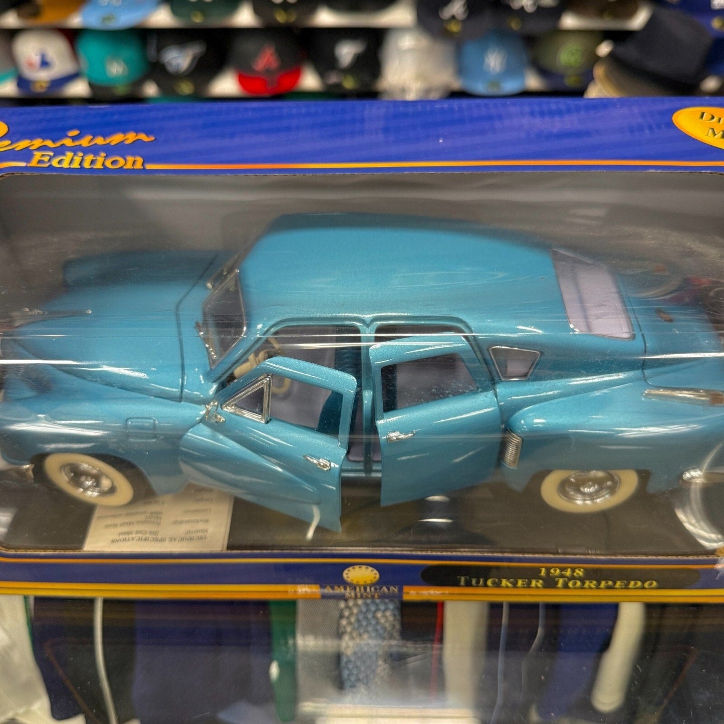 American Mint 1948 Tucker Torpedo Studebaker Metallic Blue 1/18 Scale Diecast Model Car | New - Product Image