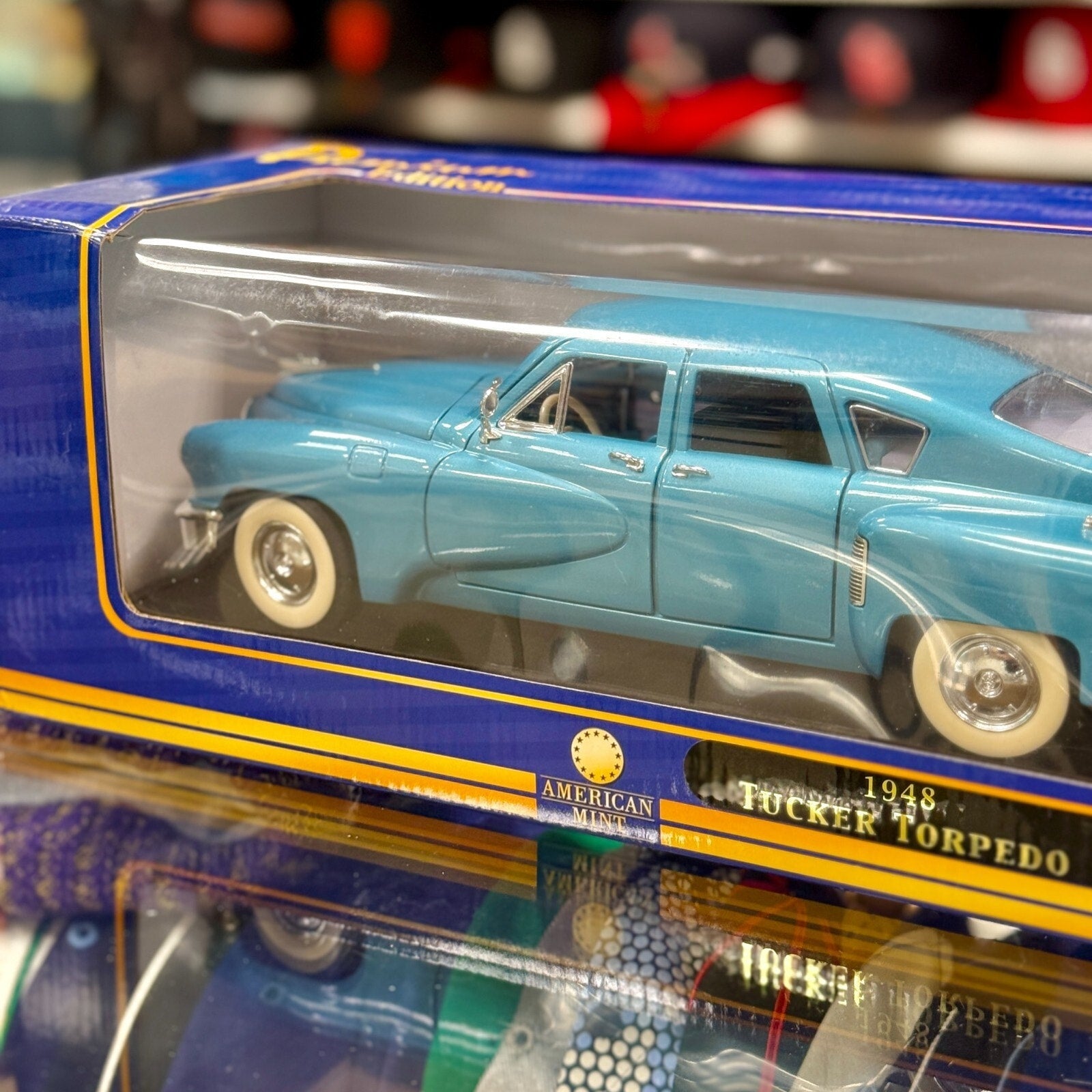 American Mint 1948 Tucker Torpedo Studebaker Metallic Blue 1/18 Scale Diecast Model Car | New - Product Image