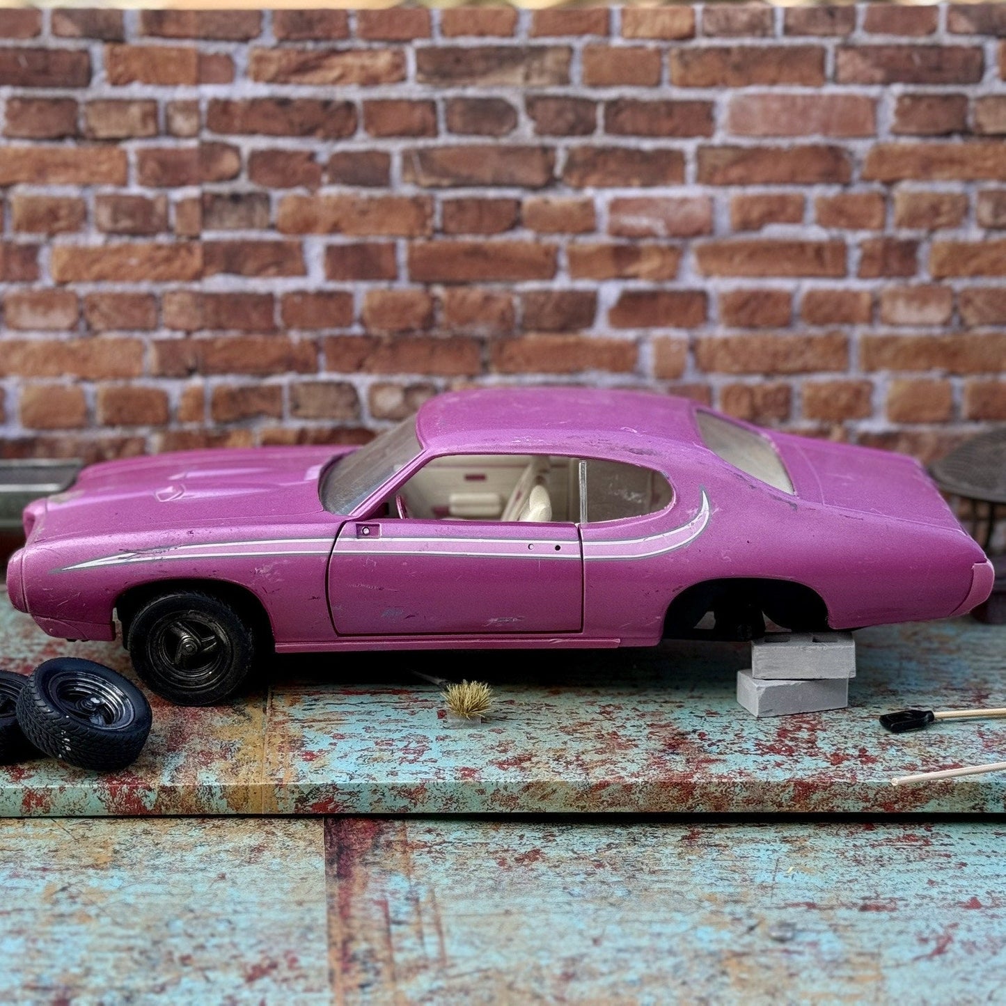 American Muscle 1969 Pontiac GTO Pink 1/18 Scale Diecast Model Car | Parts Car - Product Image