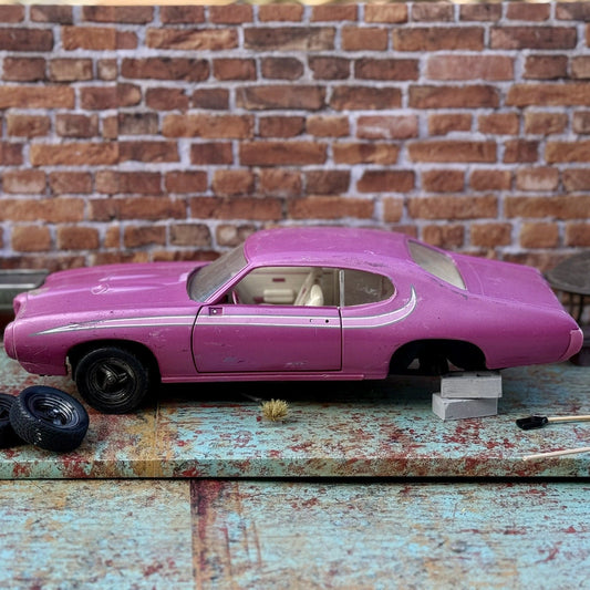American Muscle 1969 Pontiac GTO Pink 1/18 Scale Diecast Model Car | Parts Car - Product Image