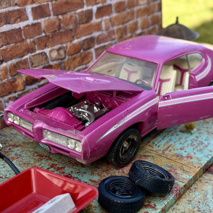 American Muscle 1969 Pontiac GTO Pink 1/18 Scale Diecast Model Car | Parts Car - Product Image