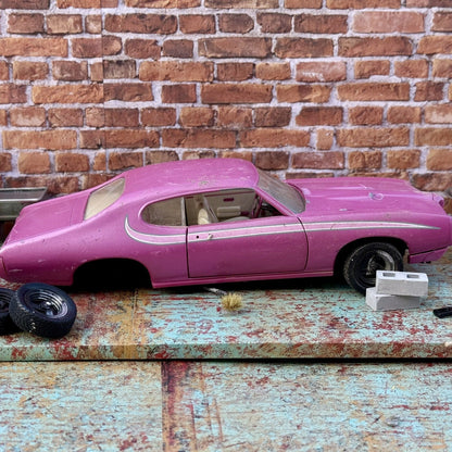 American Muscle 1969 Pontiac GTO Pink 1/18 Scale Diecast Model Car | Parts Car - Product Image