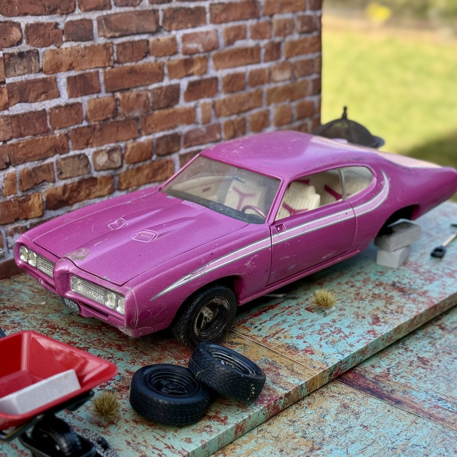 American Muscle 1969 Pontiac GTO Pink 1/18 Scale Diecast Model Car | Parts Car - Product Image