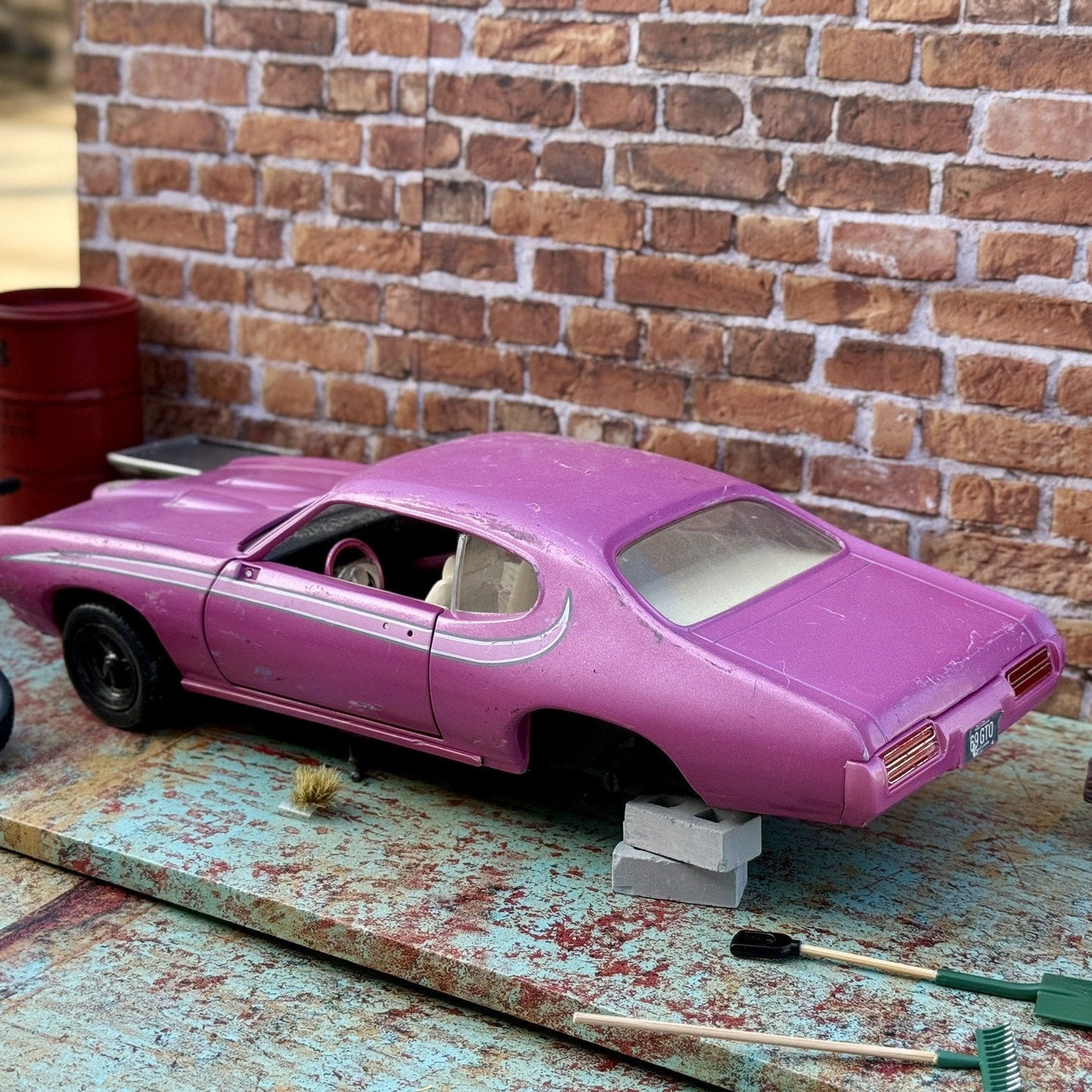 American Muscle 1969 Pontiac GTO Pink 1/18 Scale Diecast Model Car | Parts Car - Product Image