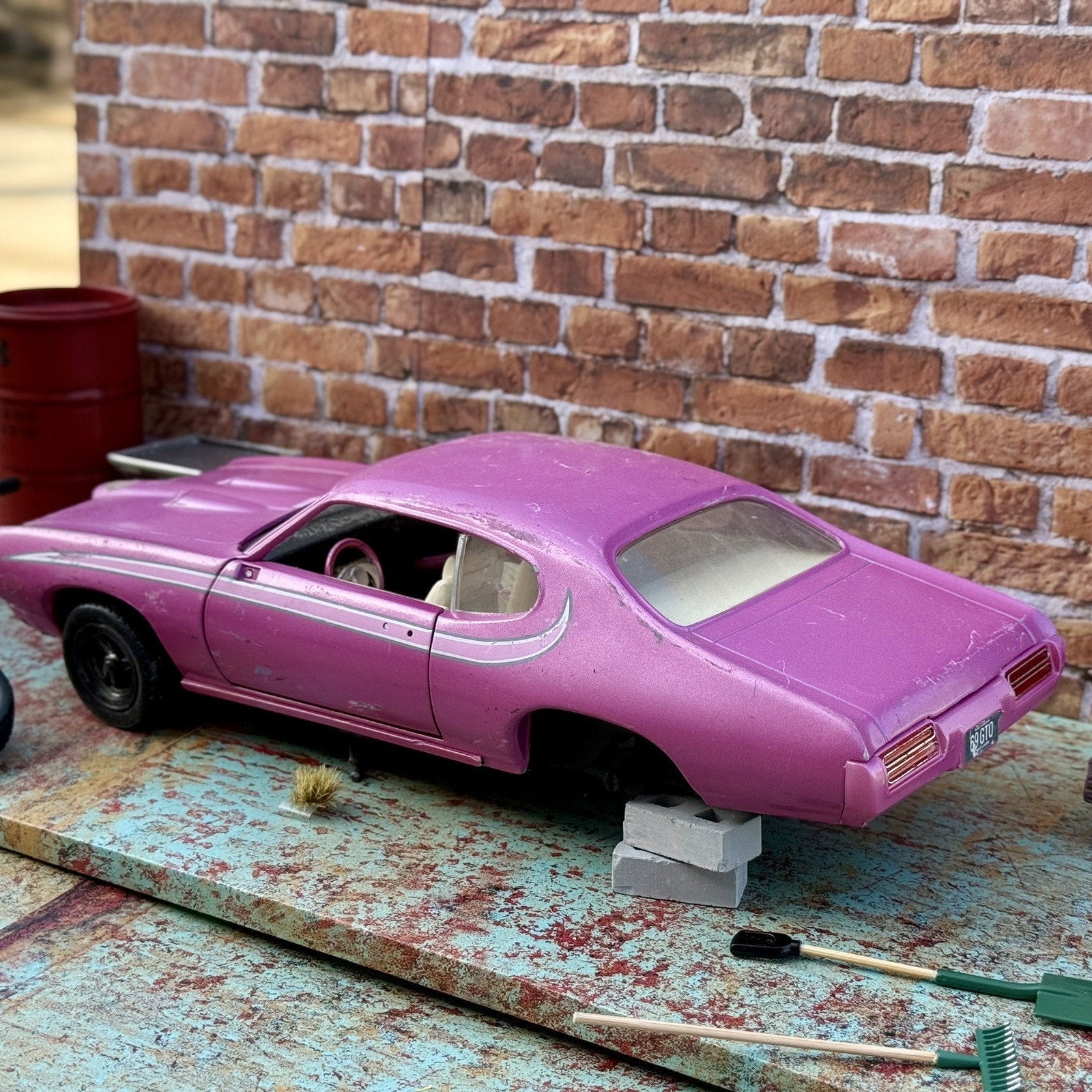 American Muscle 1969 Pontiac GTO Pink 1/18 Scale Diecast Model Car | Parts Car - Product Image