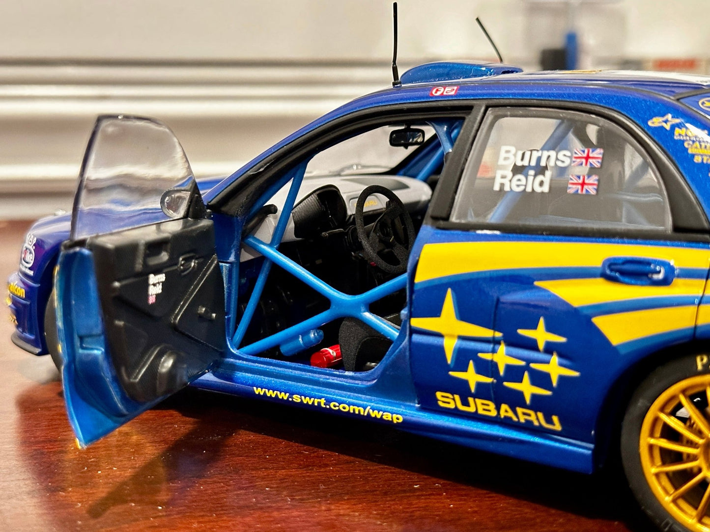 AUTOart 2001 Subaru WRX '#5 Burns Reid Rally Portugal' Blue 1/18 Scale Diecast Model Car - Product Image