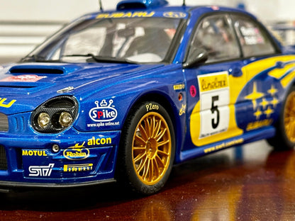 AUTOart 2001 Subaru WRX '#5 Burns Reid Rally Portugal' Blue 1/18 Scale Diecast Model Car - Product Image