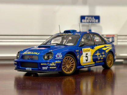 AUTOart 2001 Subaru WRX '#5 Burns Reid Rally Portugal' Blue 1/18 Scale Diecast Model Car - Product Image