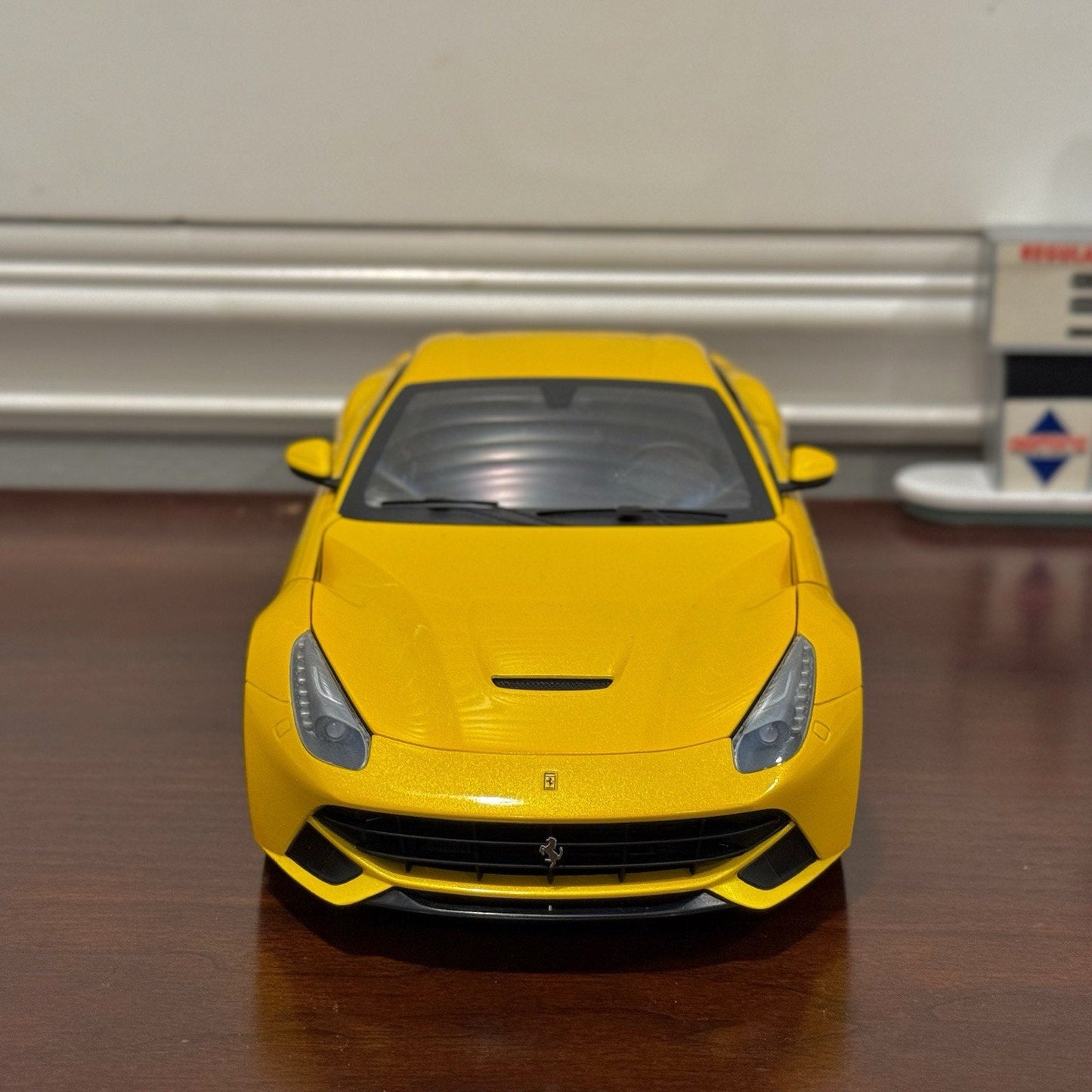 Hot Wheels Elite Ferrari F12 Giallo-Modena Yellow 1/18 Scale Diecast Model Car | Limited Edition - Product Image