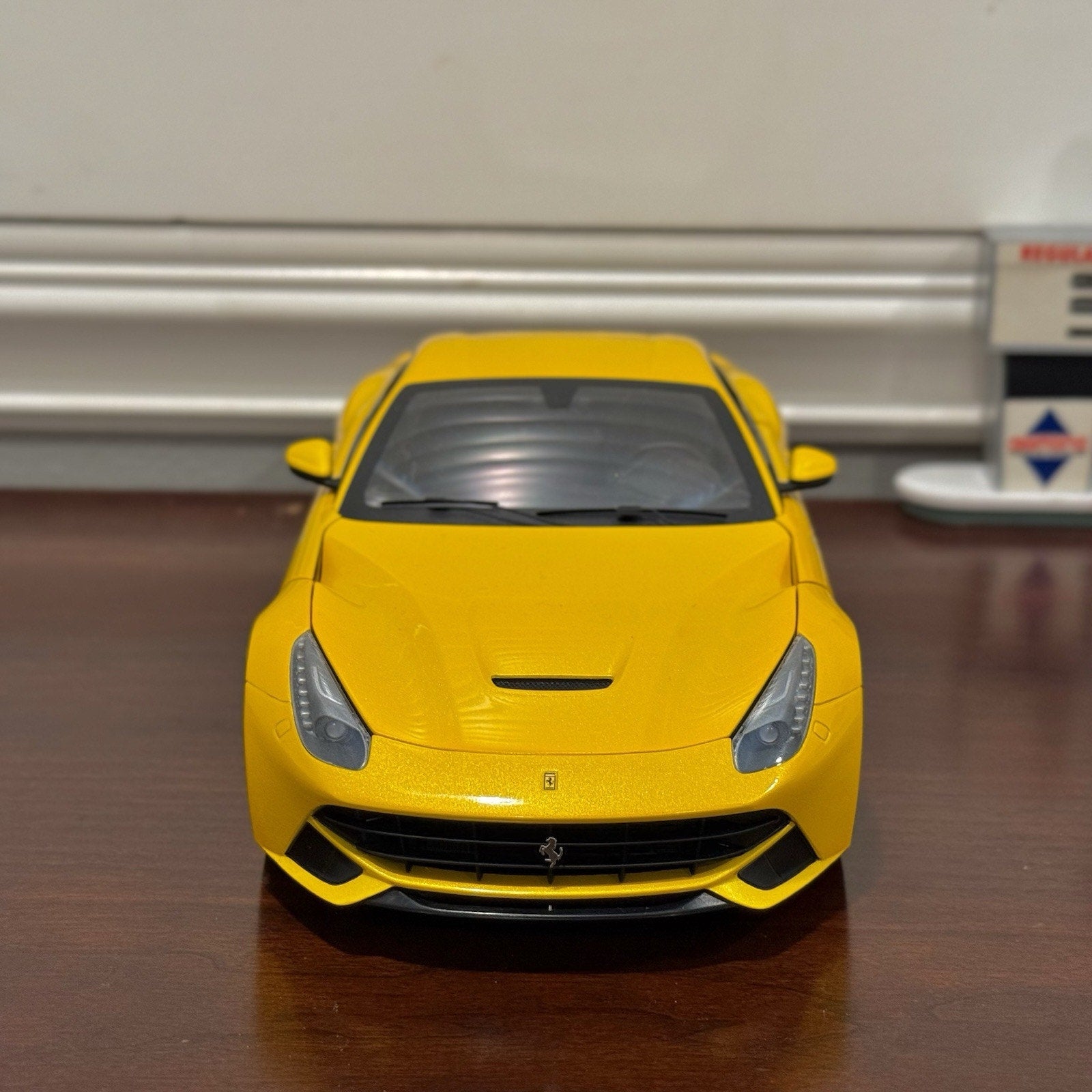 Hot Wheels Elite Ferrari F12 Giallo-Modena Yellow 1/18 Scale Diecast Model Car | Limited Edition - Product Image
