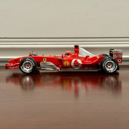 Hot Wheels Ferrari Formula One 'F2003-GA After Race Wet Wheels Michael Schumacher' 1/18 Scale Diecast Model F1 Car - Product Image