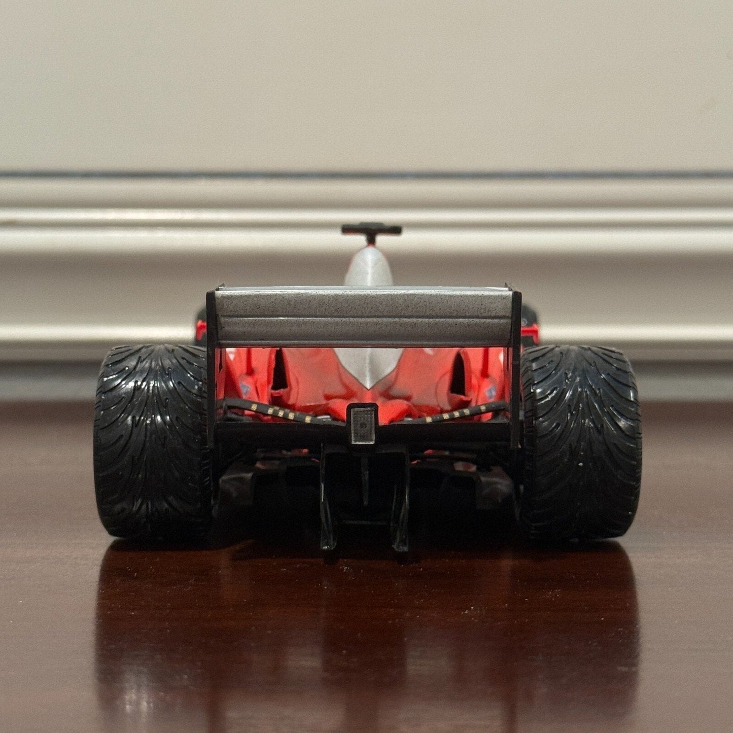 Hot Wheels Ferrari Formula One 'F2003-GA After Race Wet Wheels Michael Schumacher' 1/18 Scale Diecast Model F1 Car - Product Image