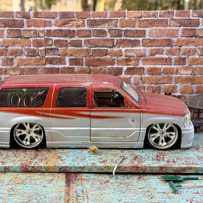 JADA DUB CITY GMC Yukon Denali Orange 1/18 Scale Diecast Model Car | Parts Car - Product Image