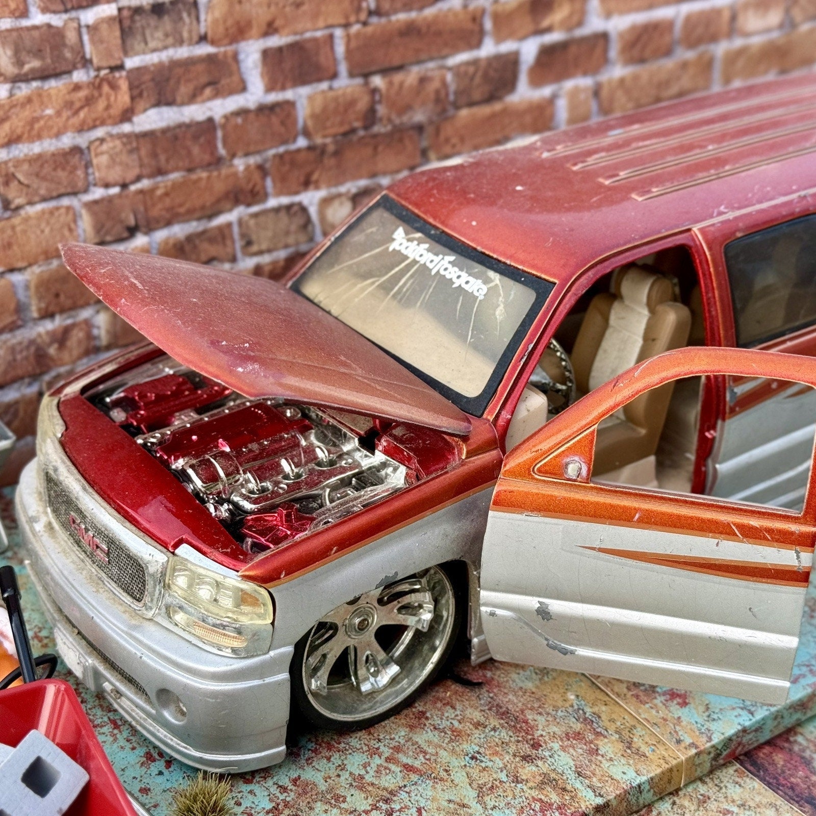 JADA DUB CITY GMC Yukon Denali Orange 1/18 Scale Diecast Model Car | Parts Car - Product Image
