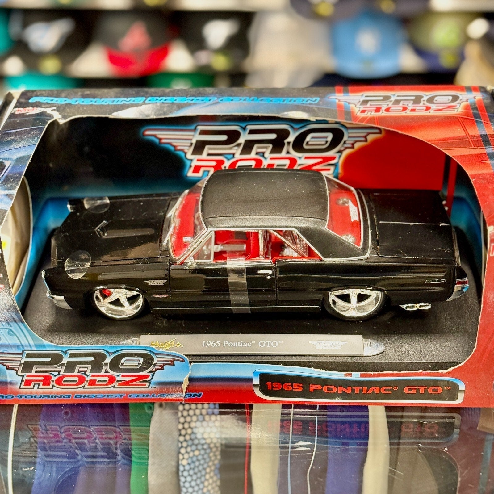 Maisto 1965 Pontiac GTO Black 1/18 Scale Diecast Model Car | New - Product Image