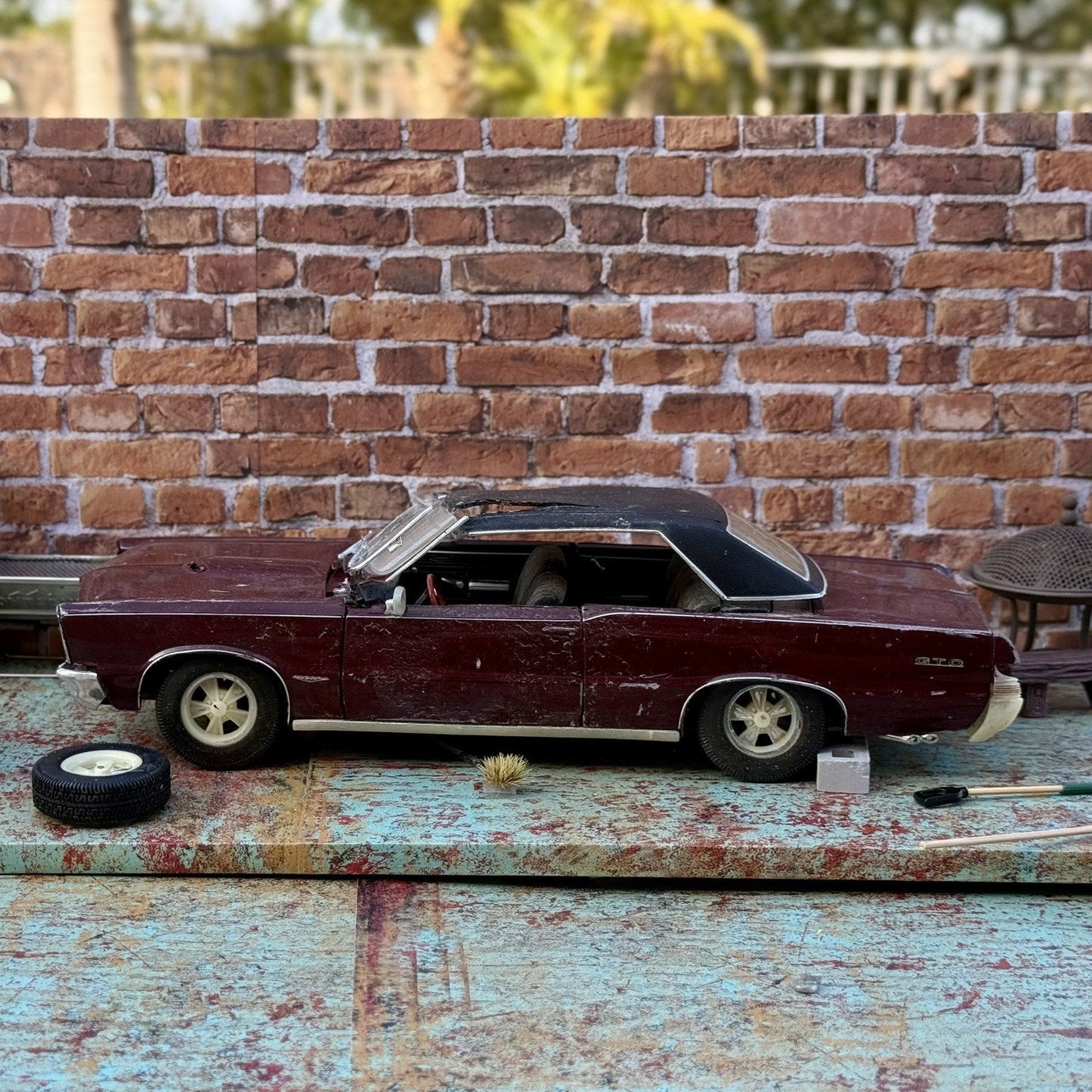 Maisto 1965 Pontiac GTO Maroon 1/18 Scale Diecast Model Car | Diorama Parts Car - Product Image