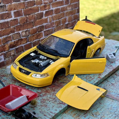 Maisto 1999 Ford Mustang GT Yellow 1/18 Scale Diecast Model Car | Diorama Parts Car - Product Image