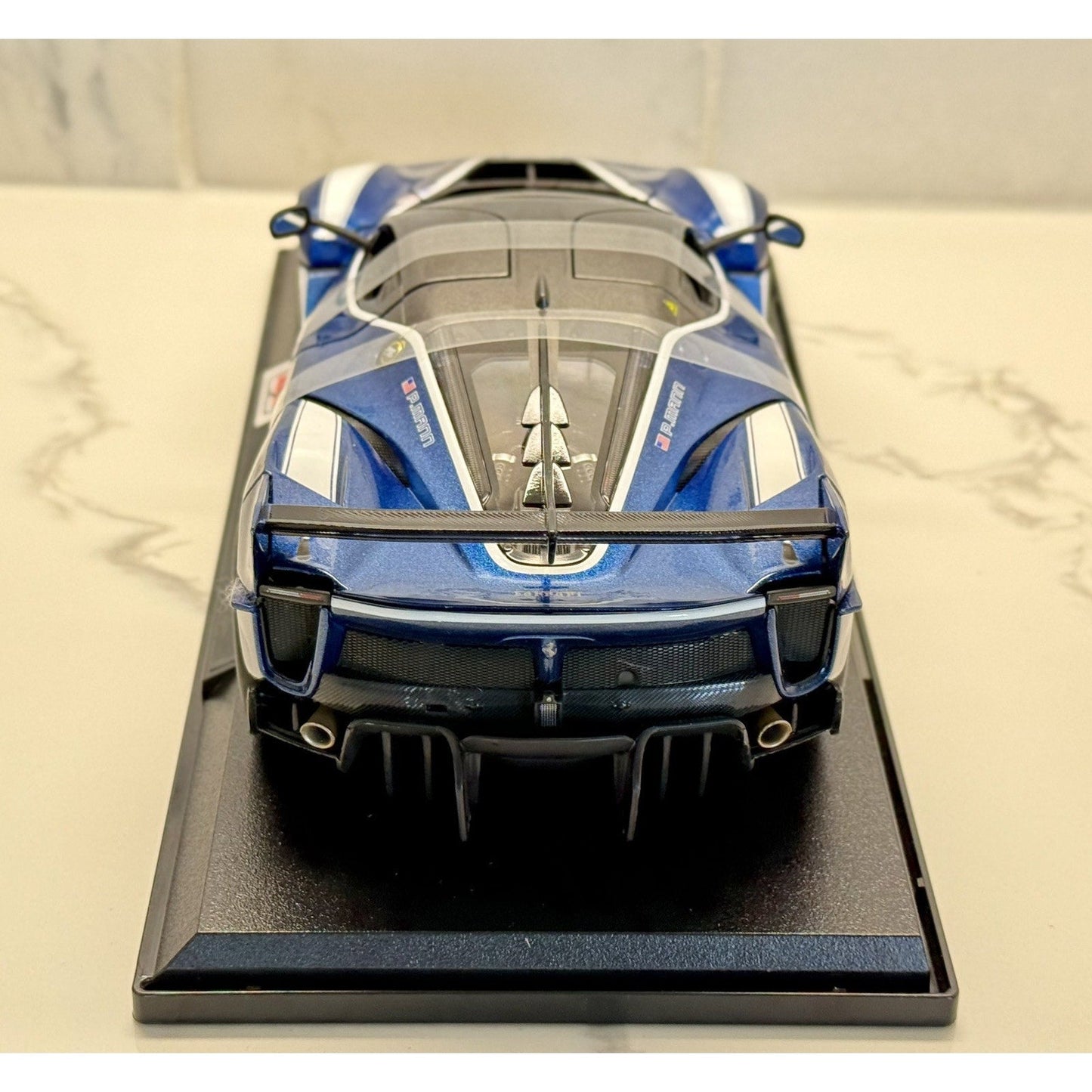 Maisto Ferrari FXXK Evo '#27 Blue P. Mann' Blue 1/18 Scale Diecast Model Car | New - Product Image