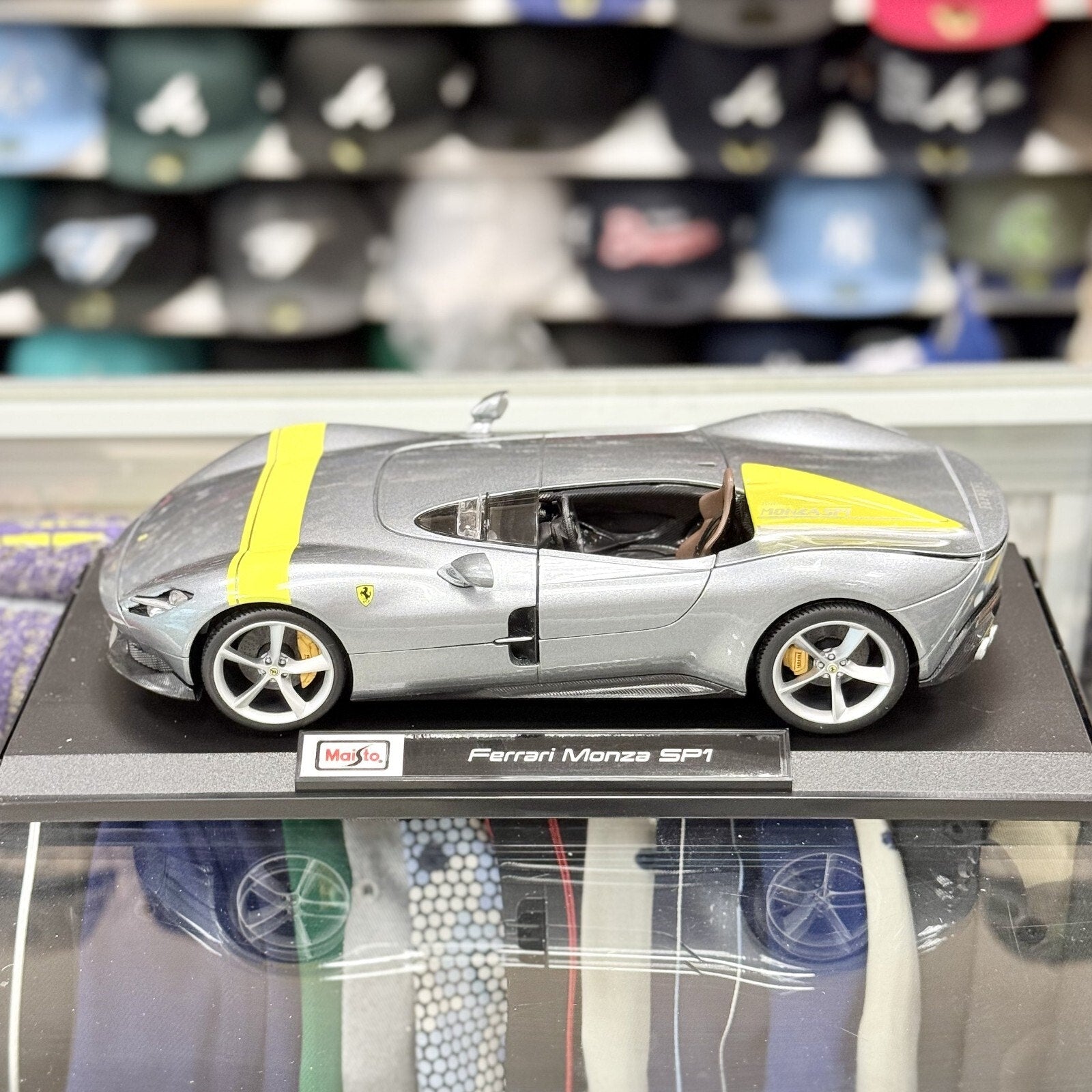 Maisto Ferrari Monza SP1 Silver w/ Yellow Stripes 1/18 Scale Diecast Model Car | New - Product Image