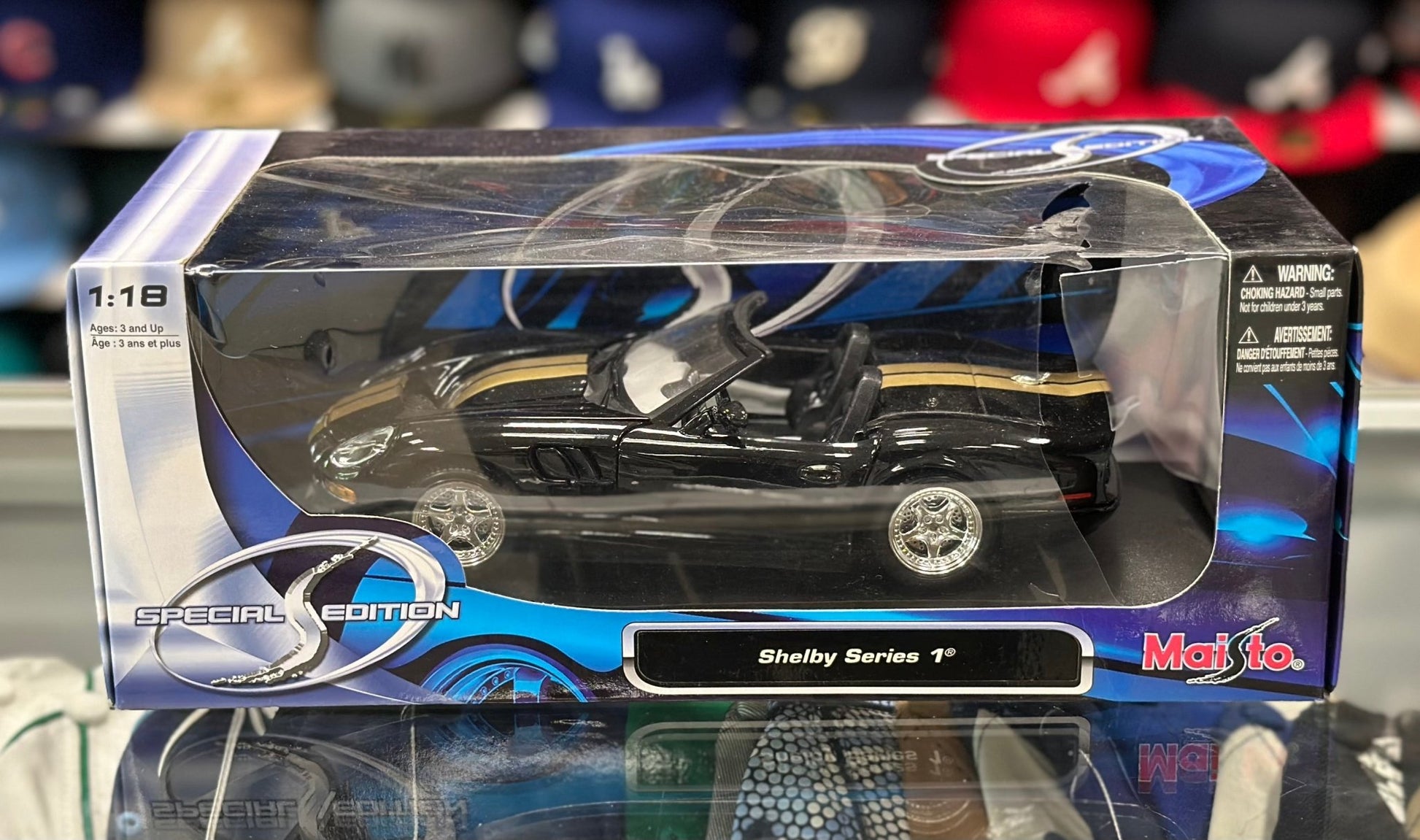Maisto Ford Shelby Series 1 Black w/ Gold Stripes 1/18 Scale Diecast Model Car - Product Image