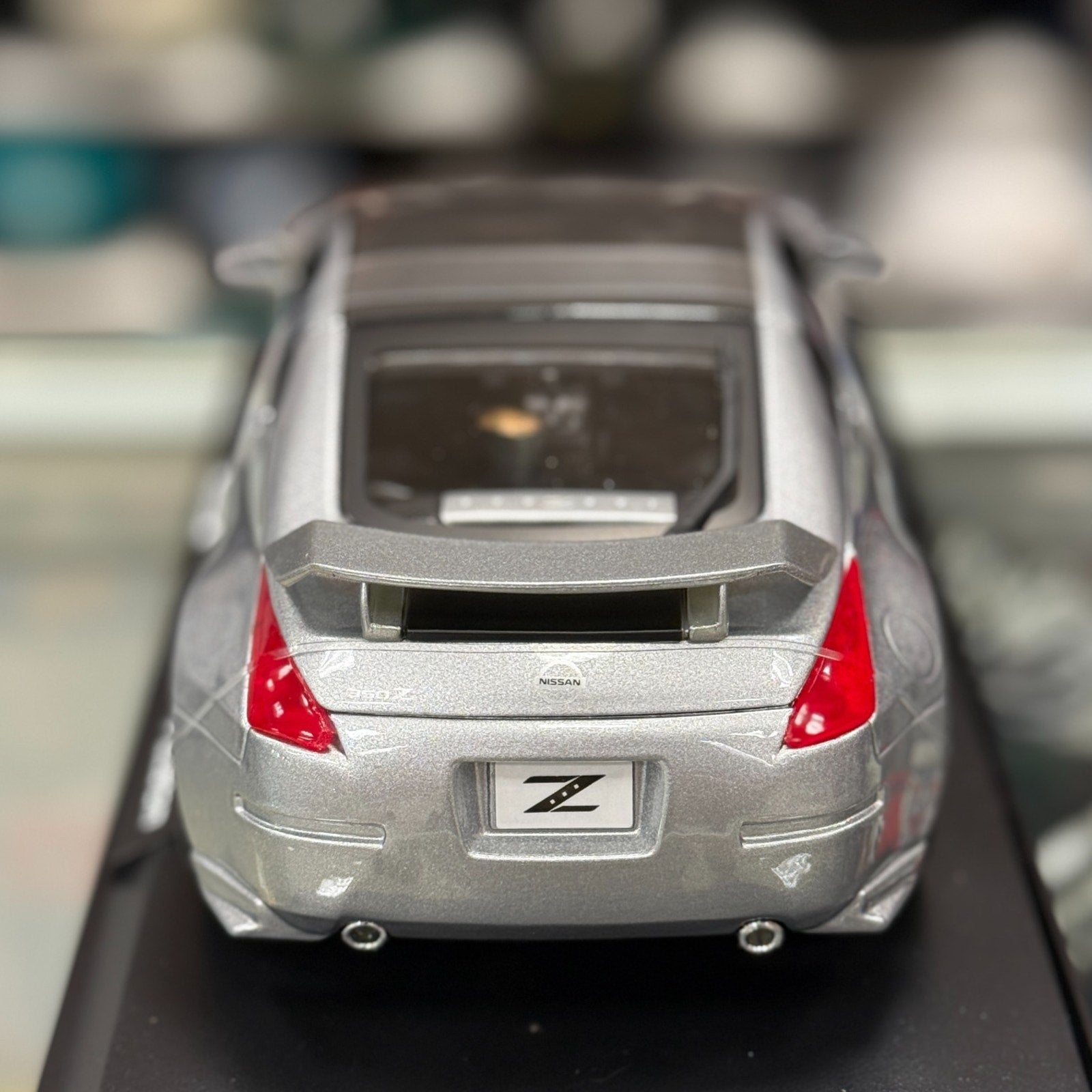 Maisto Nissan 350Z Nismo Silver w/ Bronze Wheel 1/18 Scale Diecast Model Car | New - Product Image