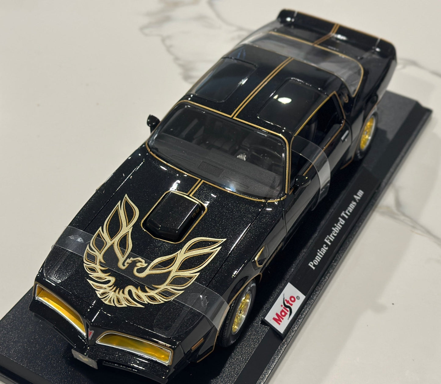 Maisto Pontiac Trans Am Firebird Black w/ Gold Livery 1/18 Scale Diecast Model Car | New - Product Image