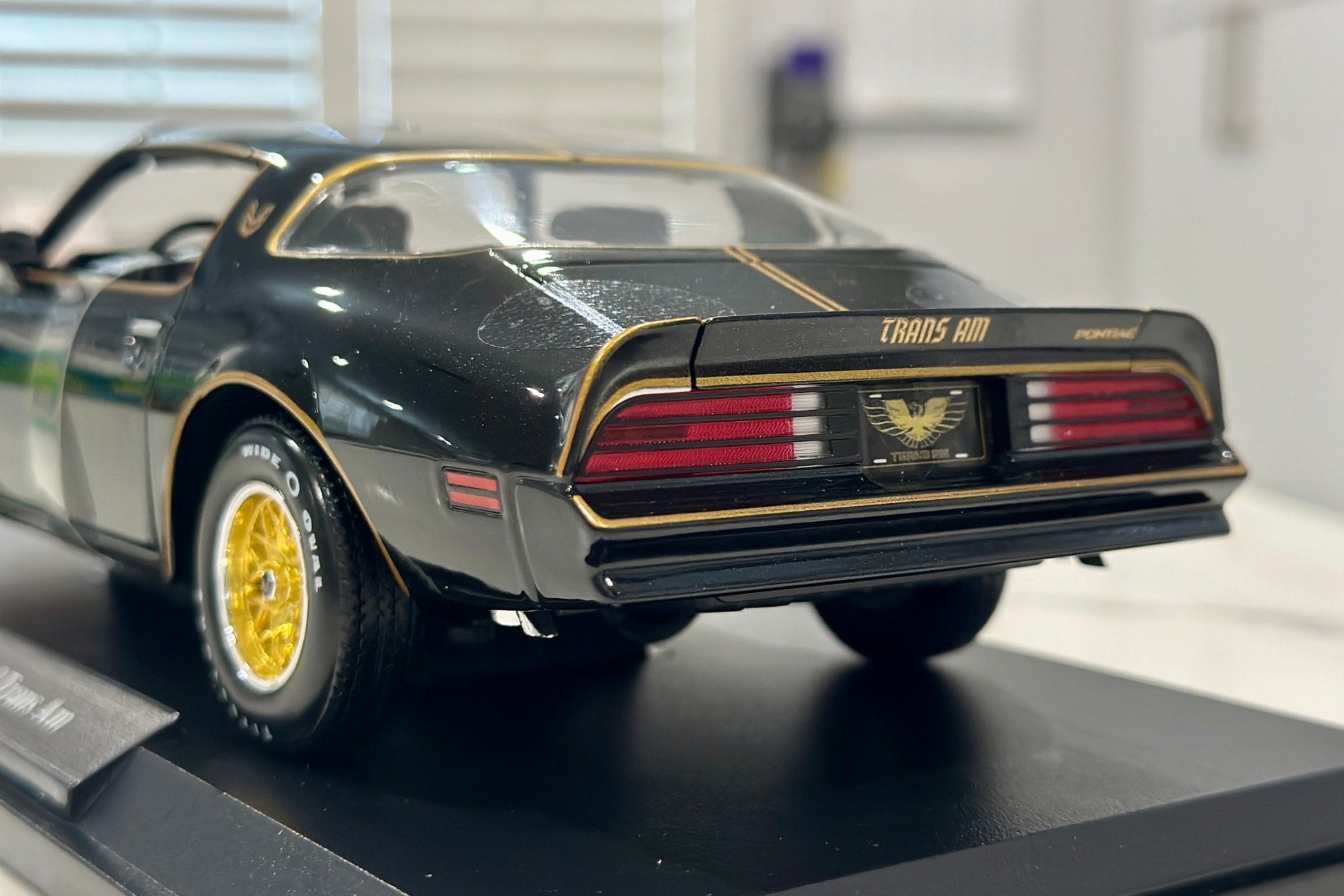 Maisto Pontiac Trans Am Firebird Black w/ Gold Livery 1/18 Scale Diecast Model Car | New - Product Image