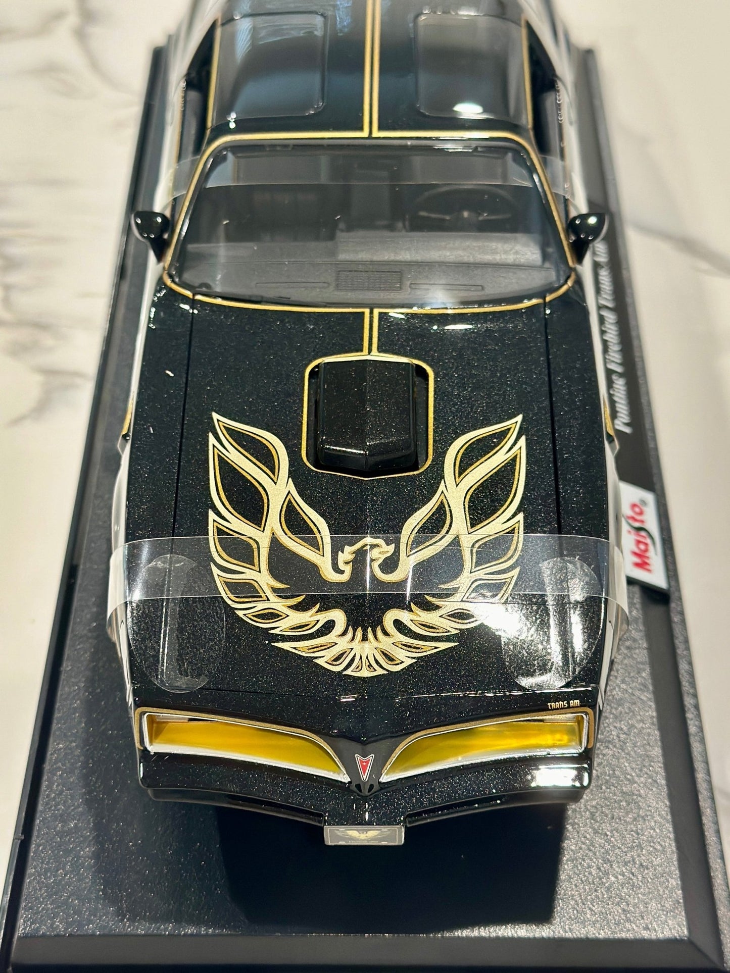 Maisto Pontiac Trans Am Firebird Black w/ Gold Livery 1/18 Scale Diecast Model Car | New - Product Image