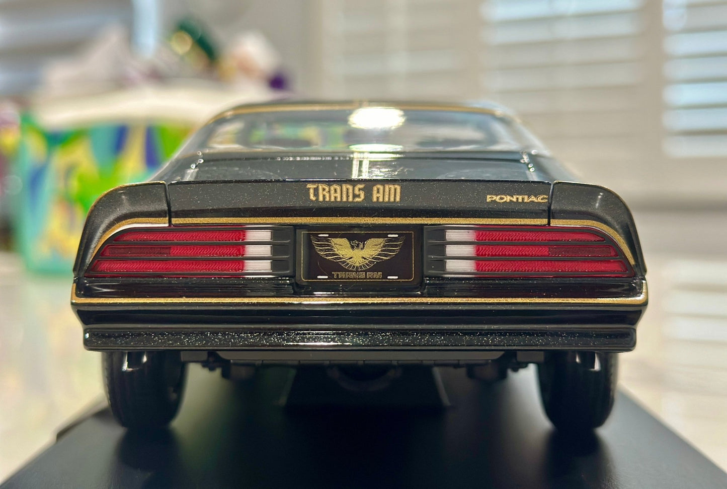 Maisto Pontiac Trans Am Firebird Black w/ Gold Livery 1/18 Scale Diecast Model Car | New - Product Image