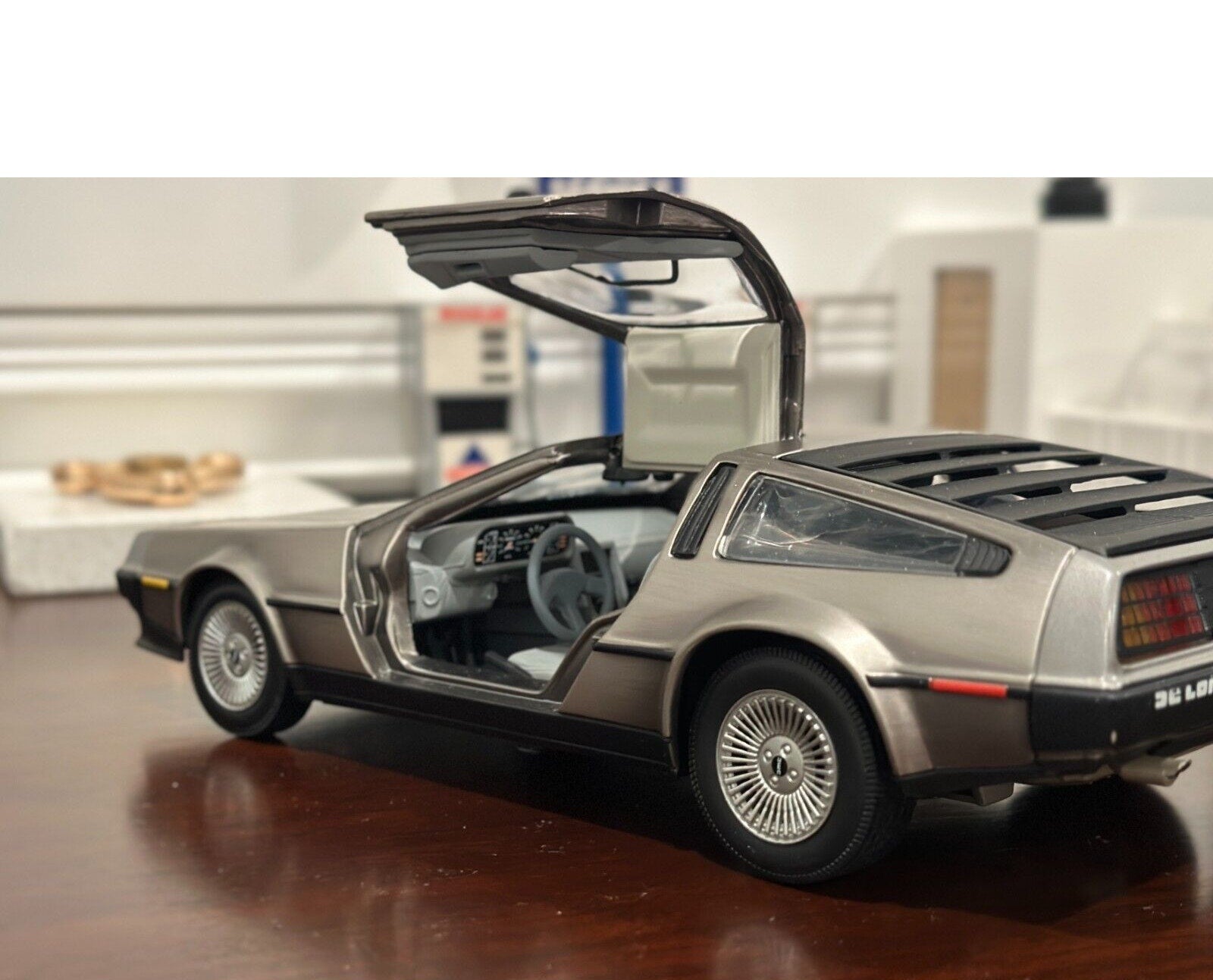 Sun Star 1981 Delorean DMC 12 LK Coupe Stainless Steel 1/18 Scale Resin Model Car - Product Image